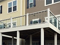 <b>White aluminum railing with glass pickets</b>